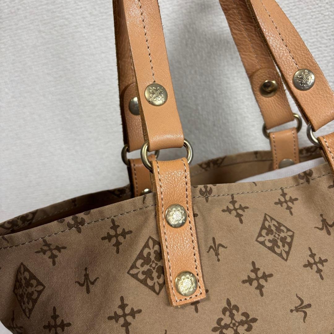 Excellent condition Russet tote bag. Canvas and leather construction with monogram design. Shoulder bag style, A4 size compatible.