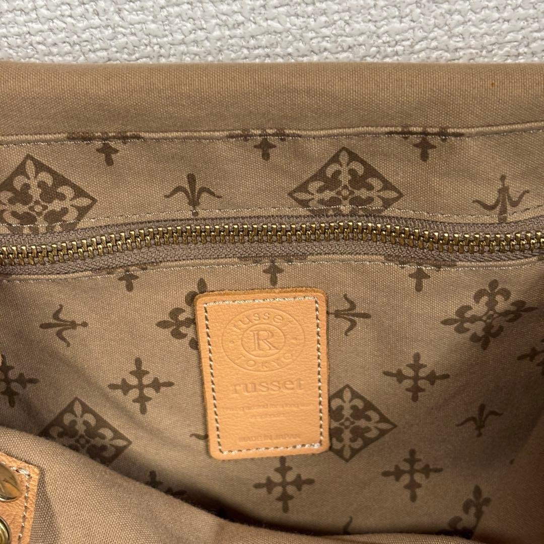 Excellent condition Russet tote bag. Canvas and leather construction with monogram design. Shoulder bag style, A4 size compatible.